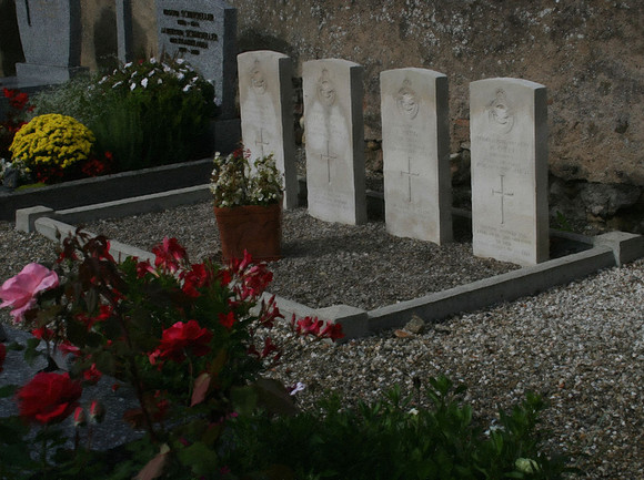 Schoenau Lancaster LL-801. The graves in the village churchyard