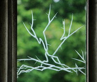 Darkness window, thorns: darkness of the time when the church was bombed and invasion threatened